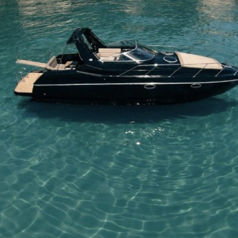 Black Luxury Yacht into the water